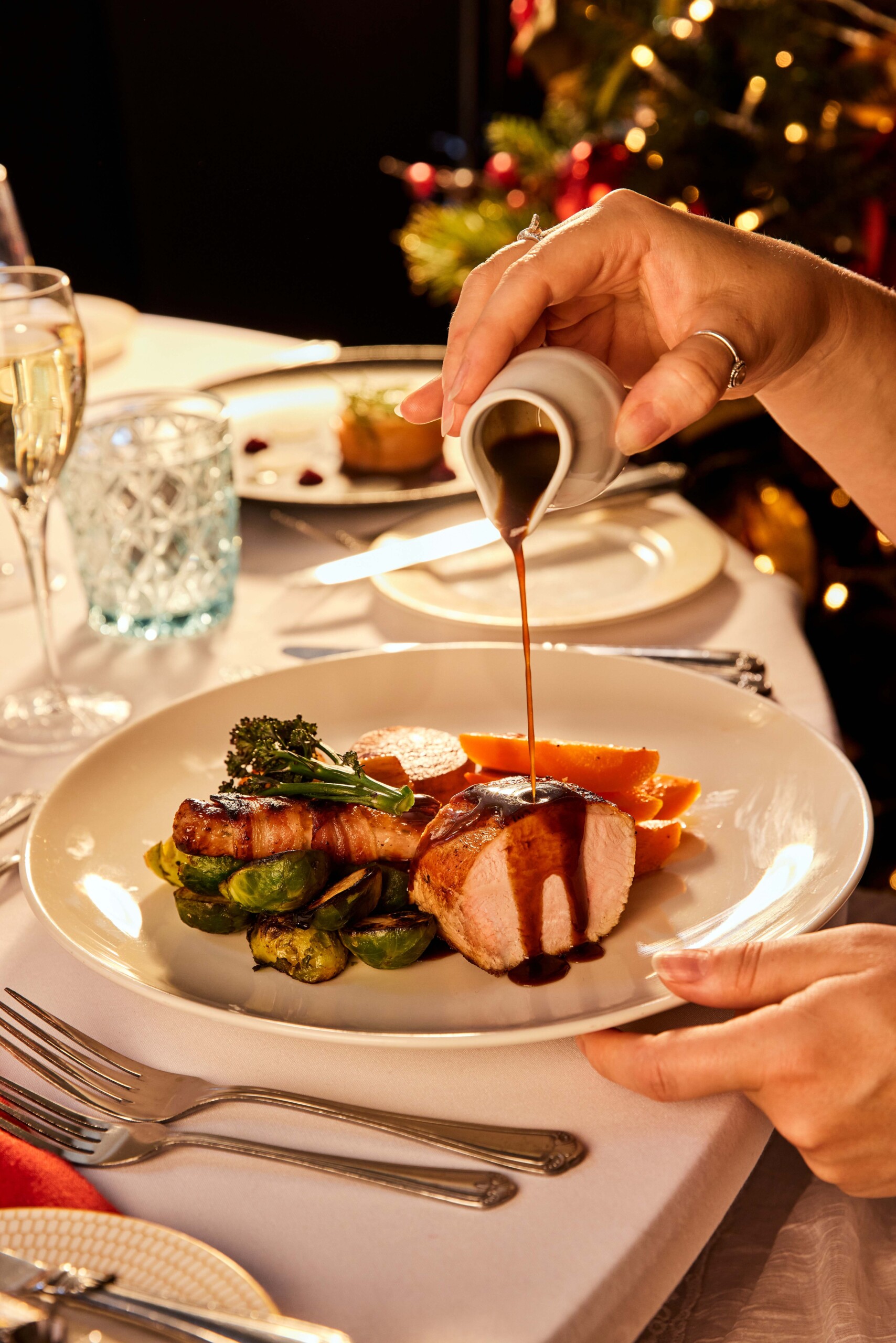 Christmas dinner is served at a party in the Pump Room